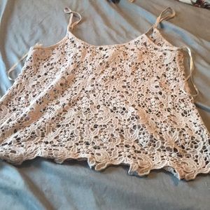 A cream colored shirt